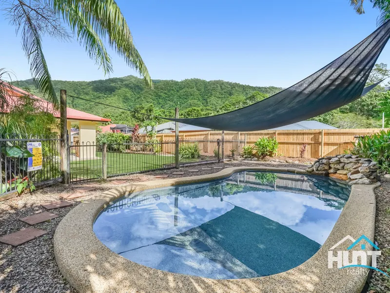 SECURE FAMILY HOME WITH SPACIOUS YARD & POOL!