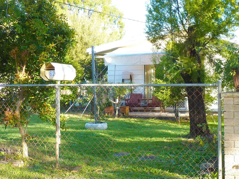 I'm a Friendly Little House in a Handy Spot!