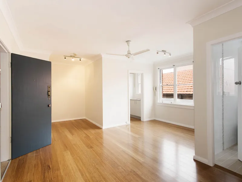 Unfurnished studio apartment on top floor