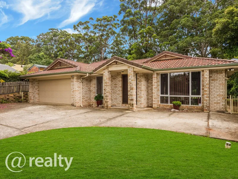 Family home on 1012m2 block backing rainforest