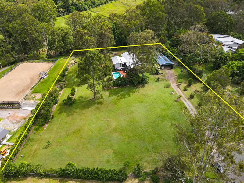 EXCEPTIONAL ACREAGE LIVING! 2 USABLE ACRES, MODERN 4 BEDROOM HOME, HUGE SHED AND ONLY 15 MINS FROM THE BEACH!