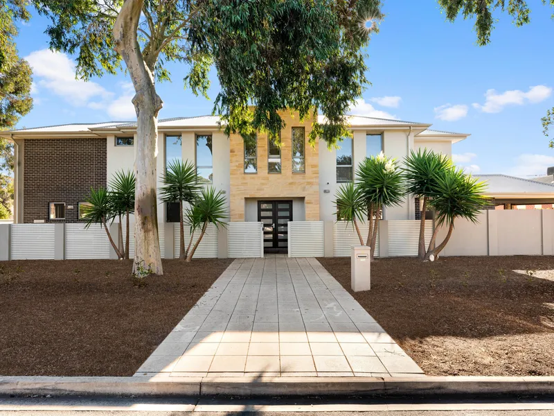 Spectacular free standing low maintenance elegant home!