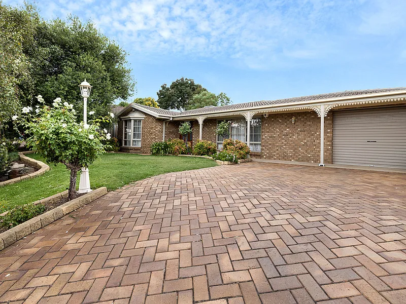 A warm & comforting family home amongst a beautiful setting