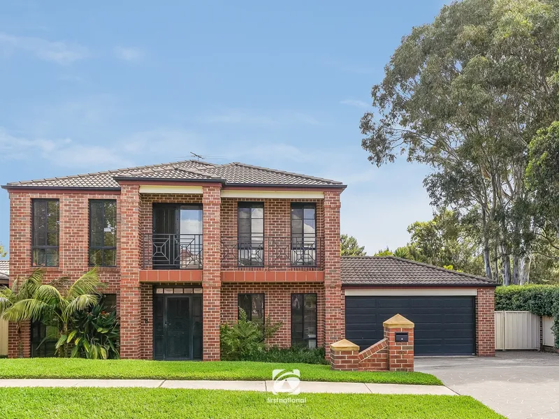 Large family home with side vehicle access in a terrific location!