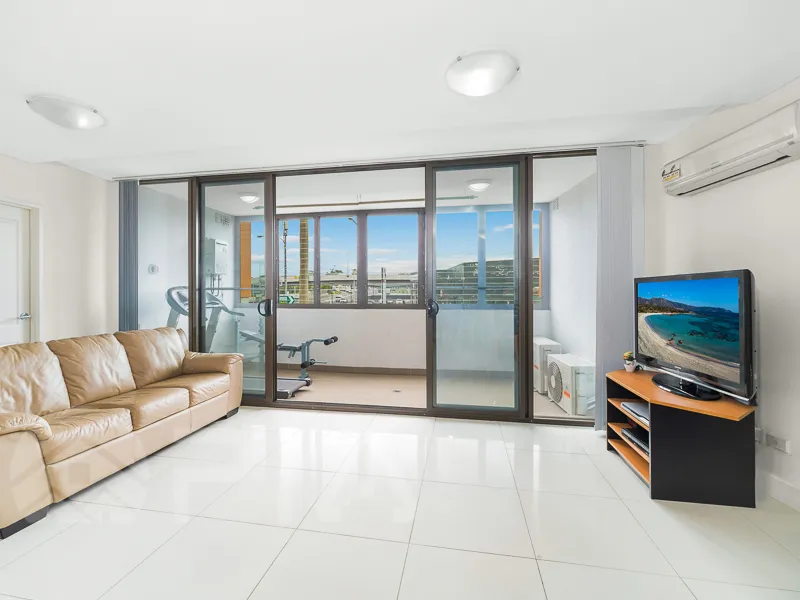 North facing apartment with large enclosed sunroom and walk in pantry