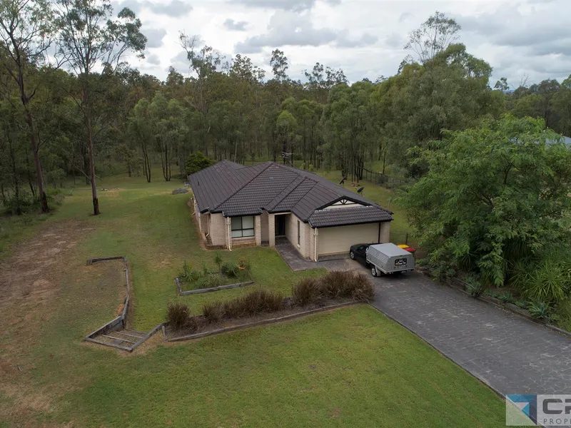 5 acres close to town brick home !!