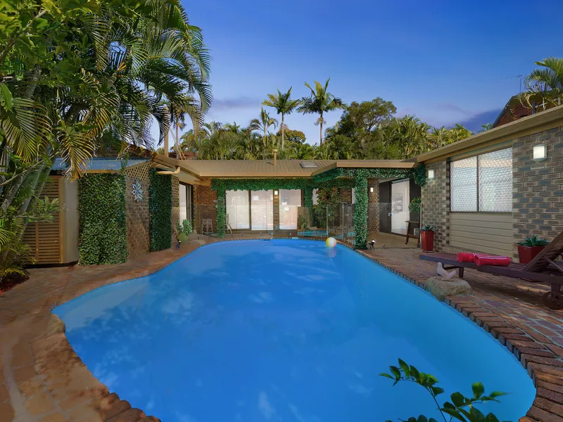 Privacy, position and pizazz at this executive style home in highly sought-after locale