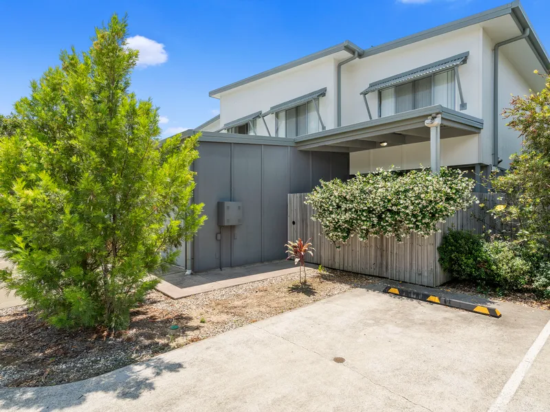 Low maintenance living in a super convenient, super tidy complex with pool!