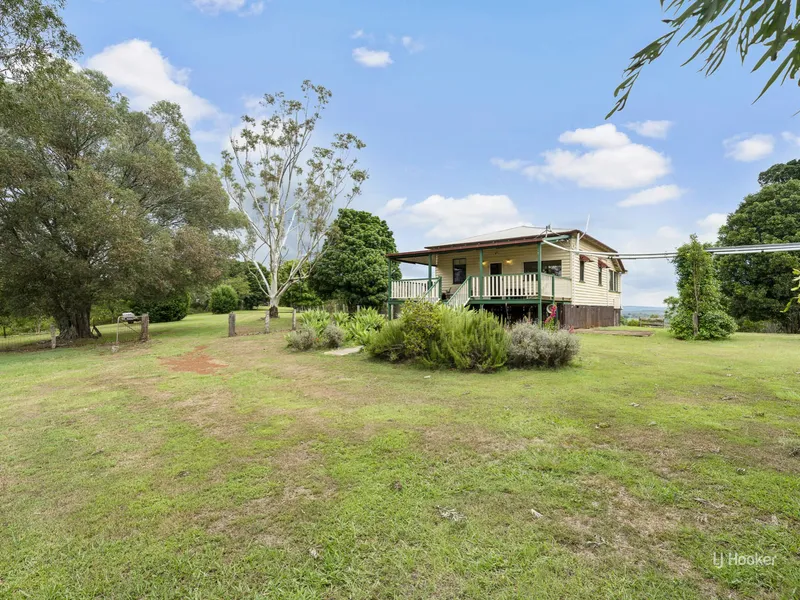 On top of the World with Expansive Green Hill views