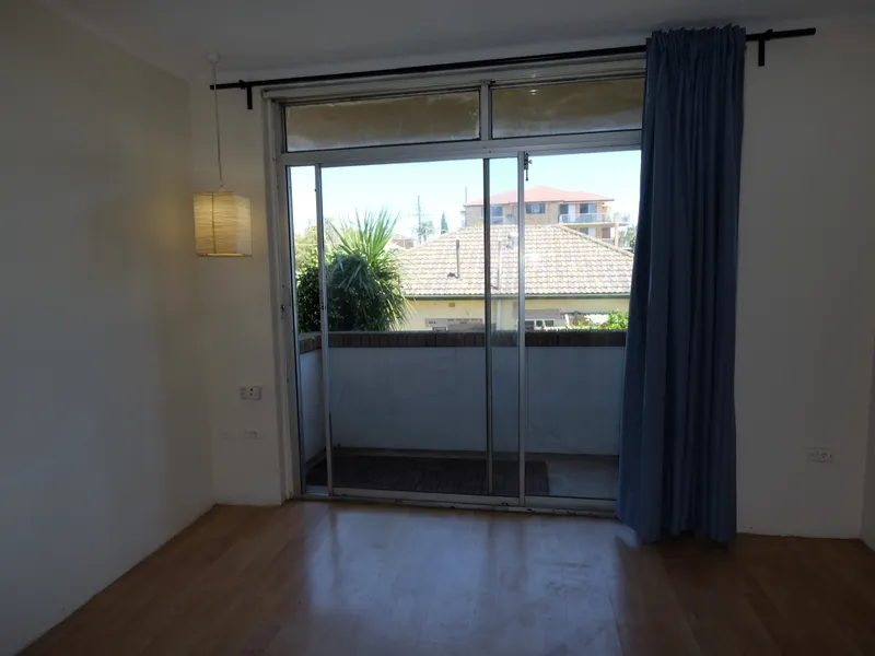 ONE BEDROOM UNIT WITH PARKING