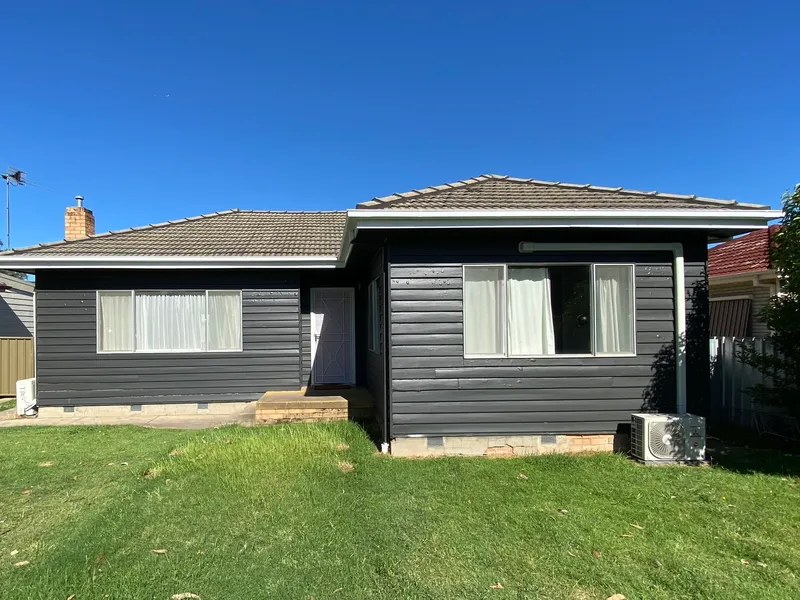 UPDATED THREE BEDROOM WITH SHED