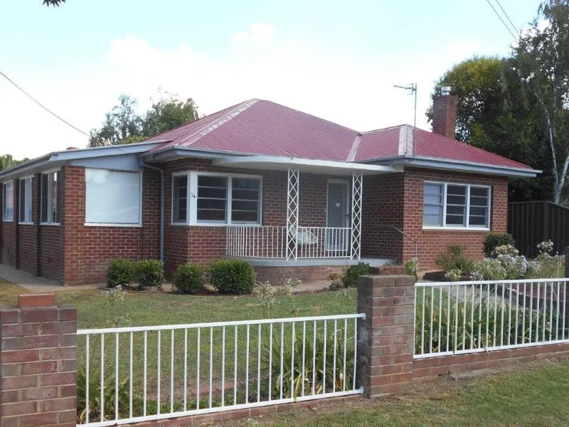 THREE BEDROOM BRICK HOME WITH LAWN AND GARDEN MAINTENANCE INCLUDED