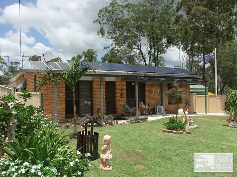 LOVELY 3 BEDROOM BRICK WITH STORAGE SPACE GALORE