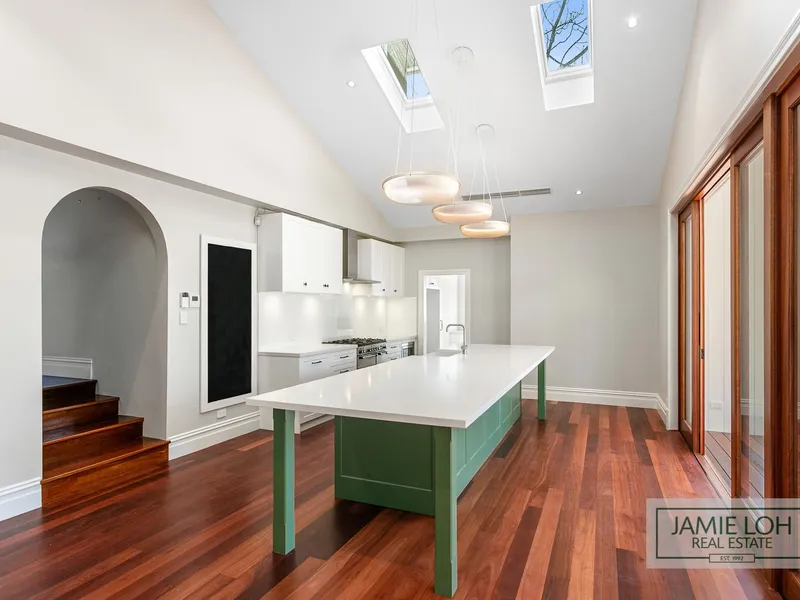 STUNNING FAMILY HOME FILLED WITH LIGHT AND SURROUNDED BY TREES