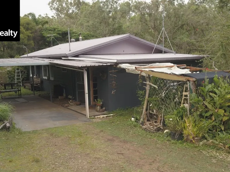 A bush home with a creek
