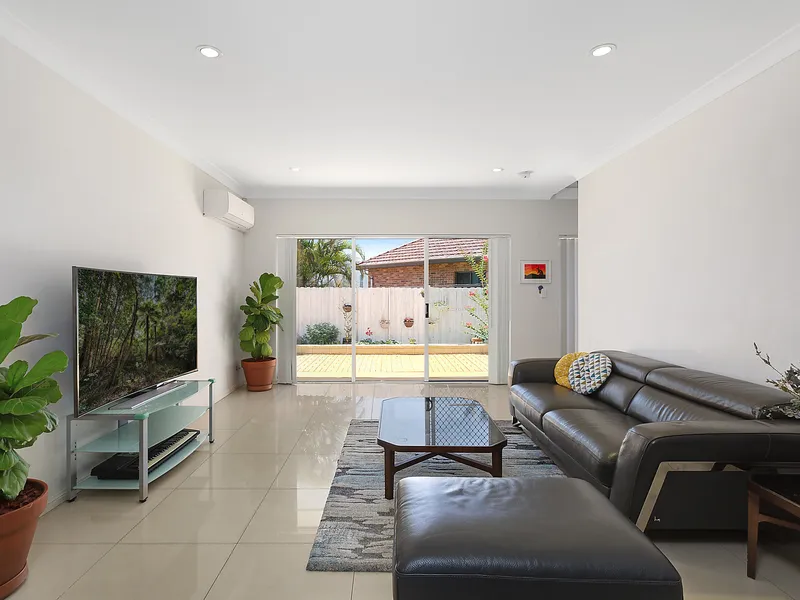 Stunning townhouse in a coveted riverside locale