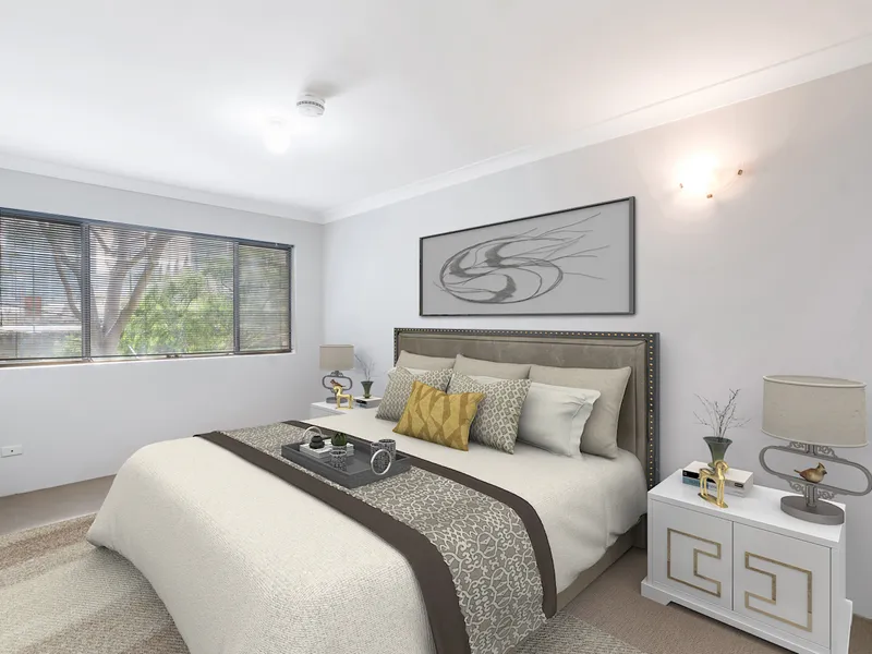 TOP FLOOR APARTMENT OFFERING FRESH PAINT AND CARPET