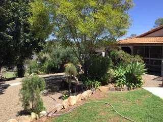 6.59 Acres, Large barn Shed, 3 Brm Brick home, self Contained quarters.  