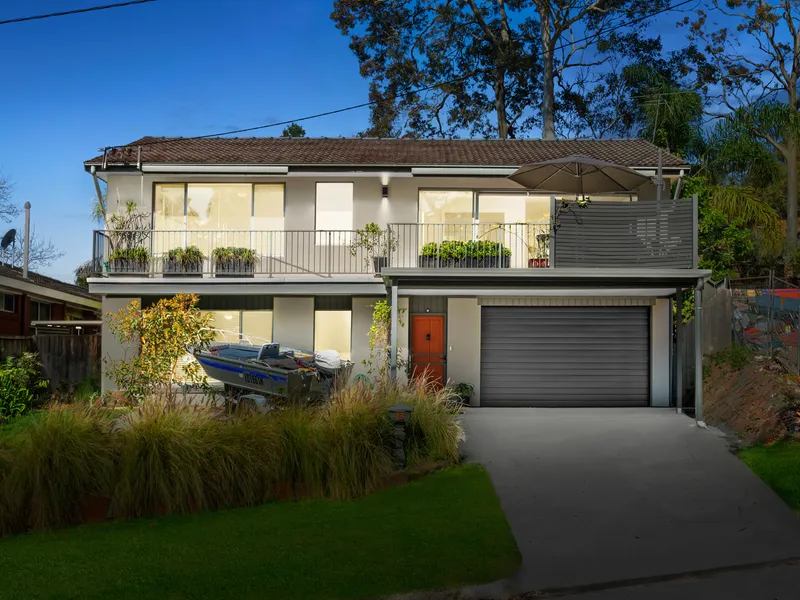 Water views, pool, yard in prime location for the family