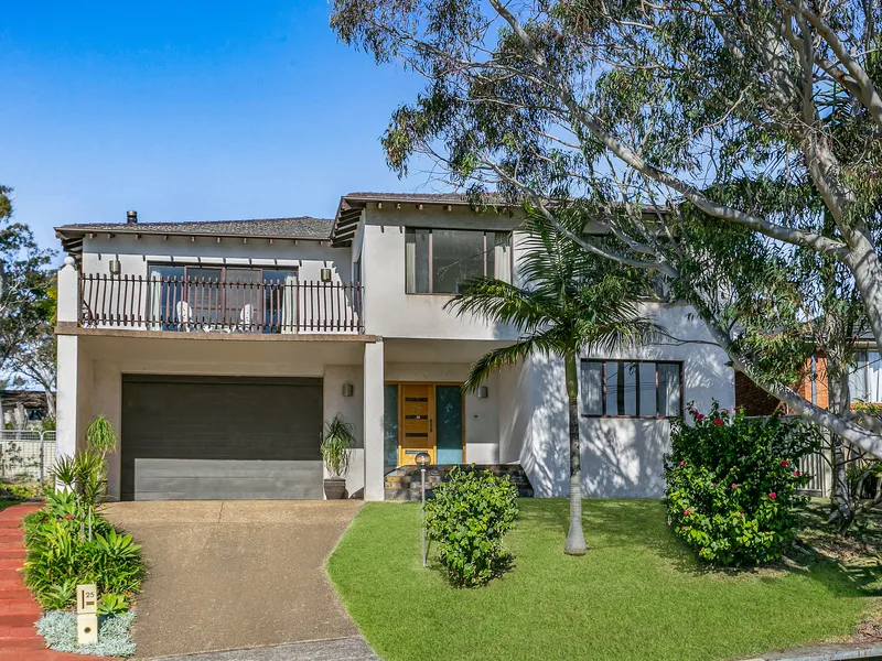 Versatile full brick family home in central village locale