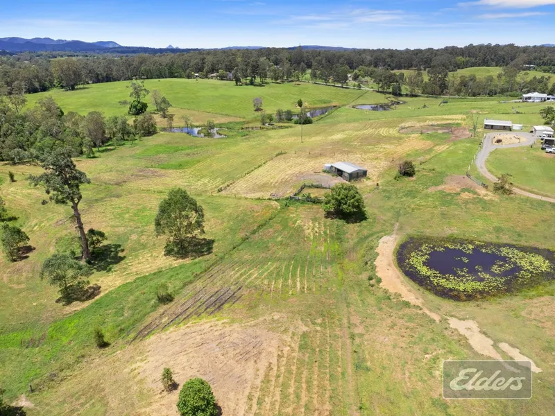 FERTILE 30 ACRE FARM WITHIN MINUTES TO TOWN ZONED RURAL RES.