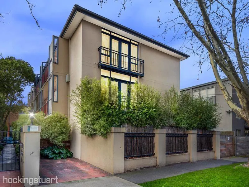 Secluded At The Rear On A Tree Lined Street