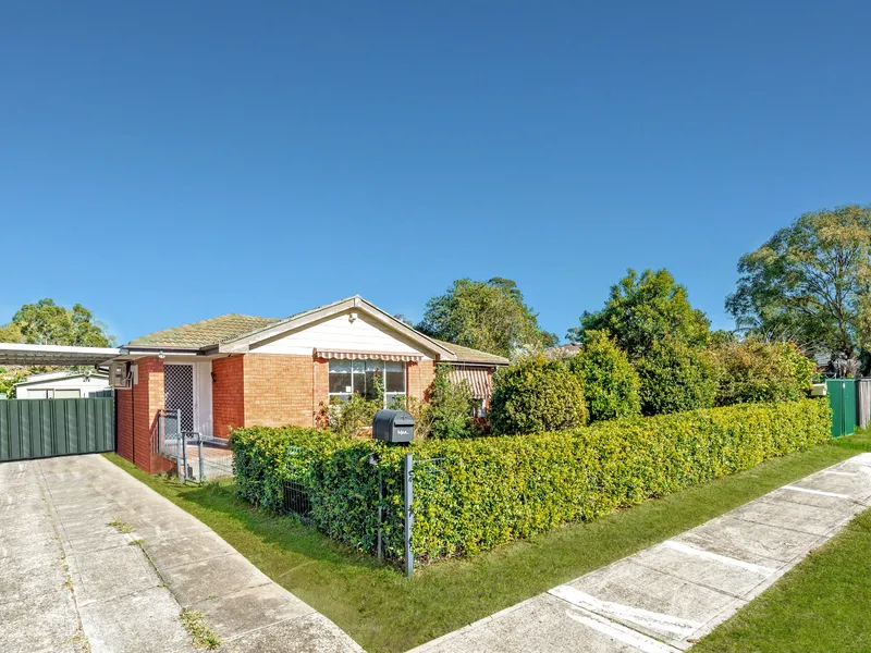 Charming four bedroom family home with an oversized yard!