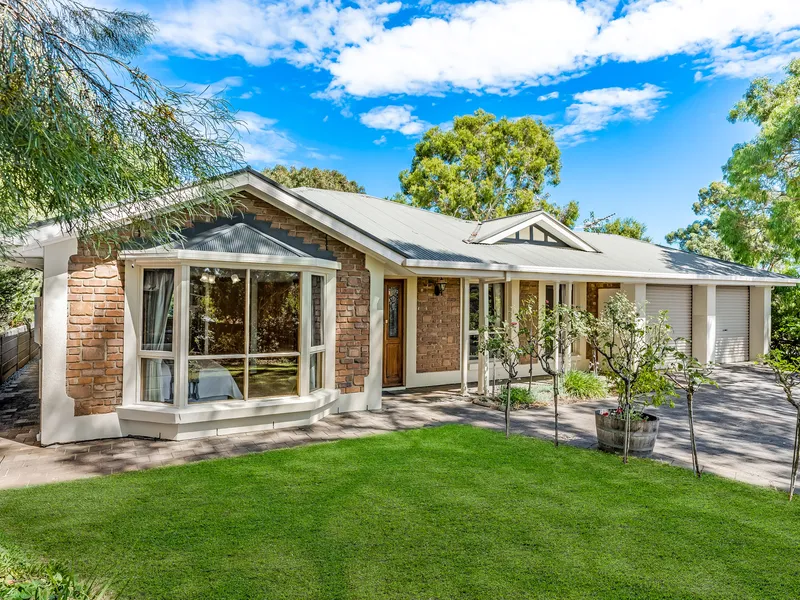 Spacious and Private Family Home in a Beautiful Garden Setting