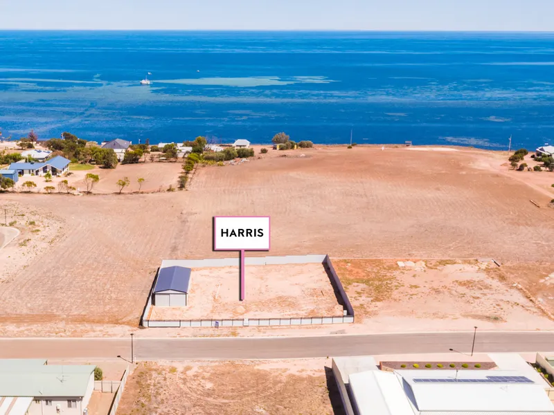 1164sqm parcel, 12m x 6m shed, bathroom, septic, fenced and sea view…. What more could you want?
