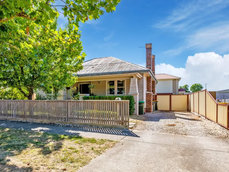 A charming home, full of character, centrally located with adaptable floorplan for the growing family!