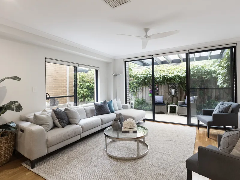 Three-level townhouse quietly positioned towards the rear of the complex