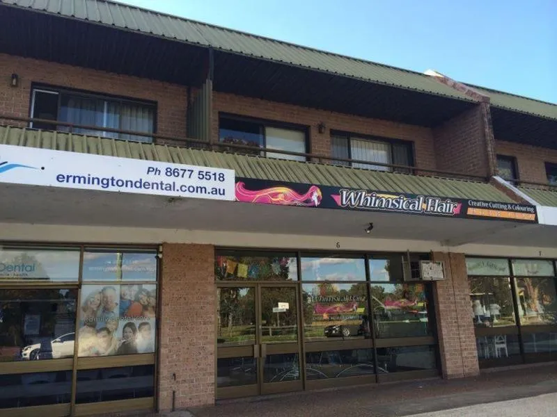 TOP FLOOR 2 BEDROOM UNIT ABOVE SHOPS IN PRIME LOCATION!