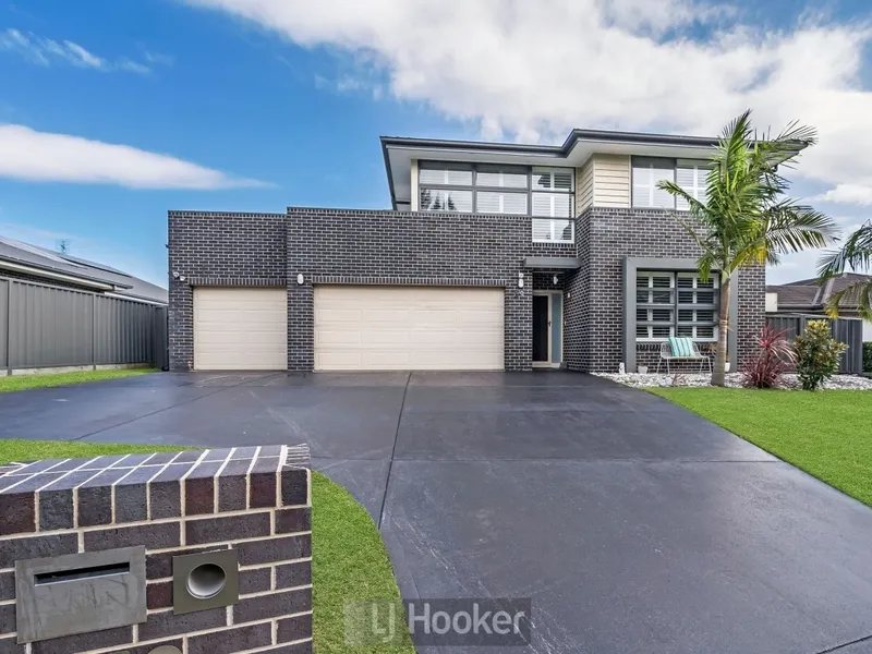 THE EPITOME OF SPACIOUS FAMILY LIVING WITH A PEACEFUL BUSH OUTLOOK - UNDER OFFER