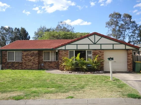 Charming Three Bedroom Home with Spacious Back Yard