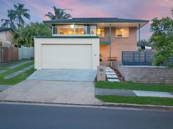 NEAT FAMILY AIR CONDITIONED HIGH-SET HOME WITH DOUBLE LOCK UP & A LARGE SHED!