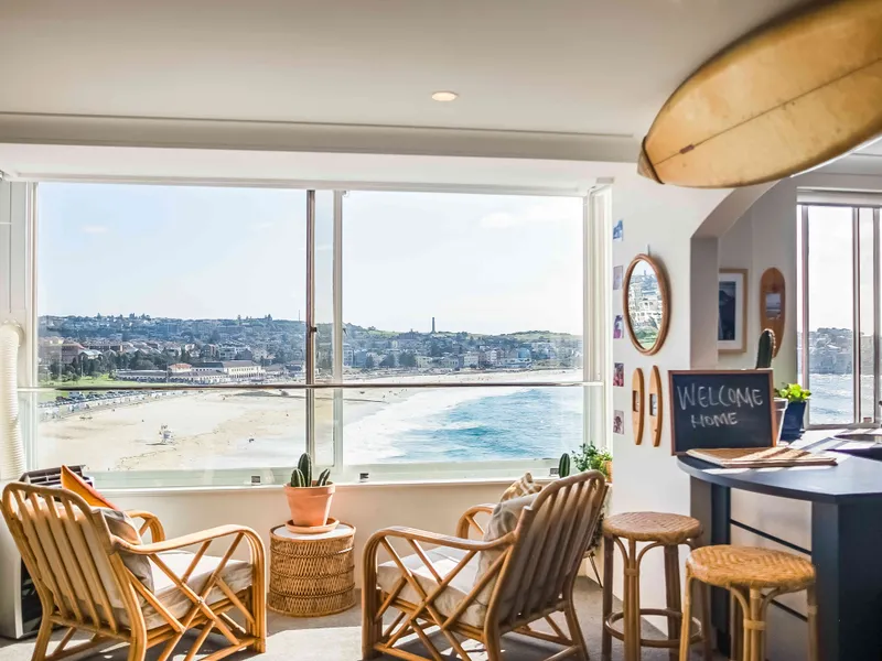 Furnished Surf Themed One Bedroom with Sweeping Ocean Views + Parking