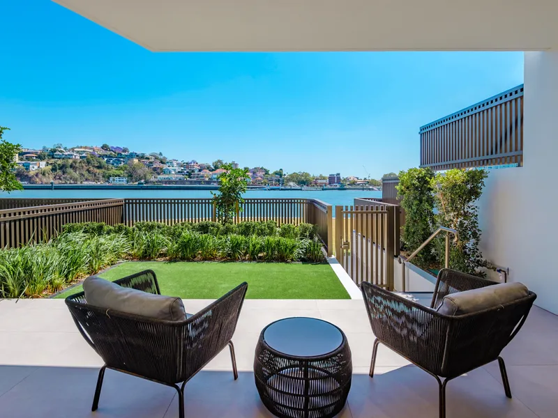 Unique north facing riverfront apartment with private courtyard