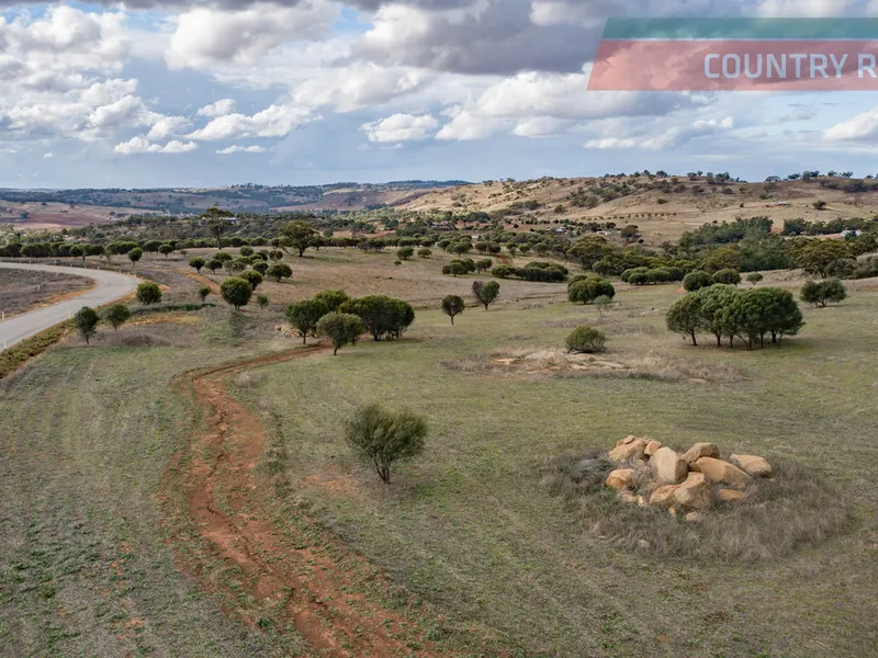 Beautiful Hillside Block with Views & Water