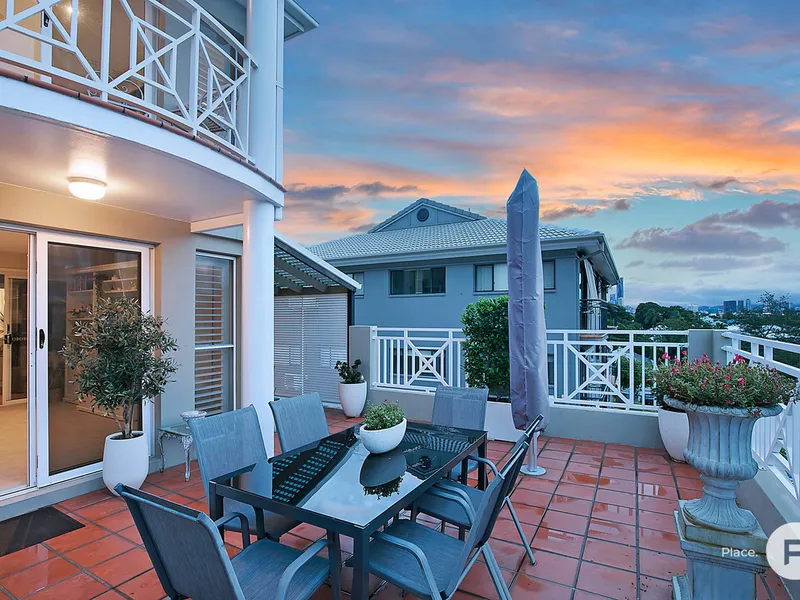 Elegant tightly-held townhome in prestigious suburb