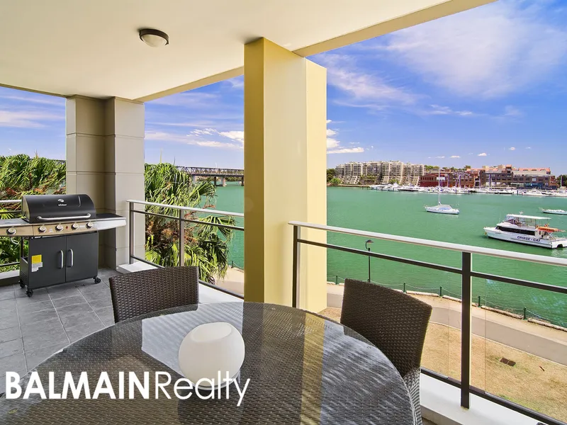 Three Bedroom Waterfront Apartment with Panoramic Harbour Views & Two Car Spaces in Balmain Shores Complex