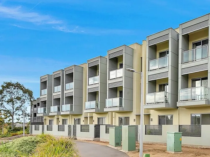 Stunning 3-Storey Townhouse with Breathtaking Mawson Lakes Views!