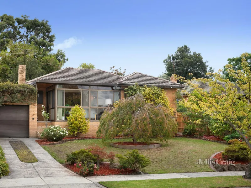 Updated brick home in peaceful position