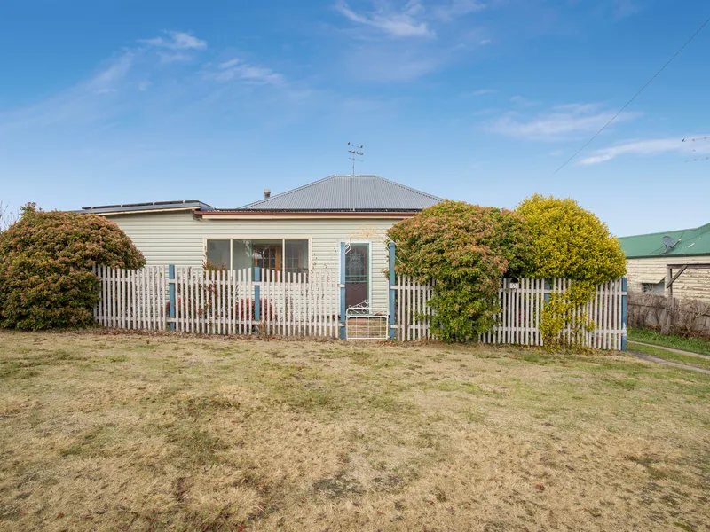 Cute as a button with so much character and charm