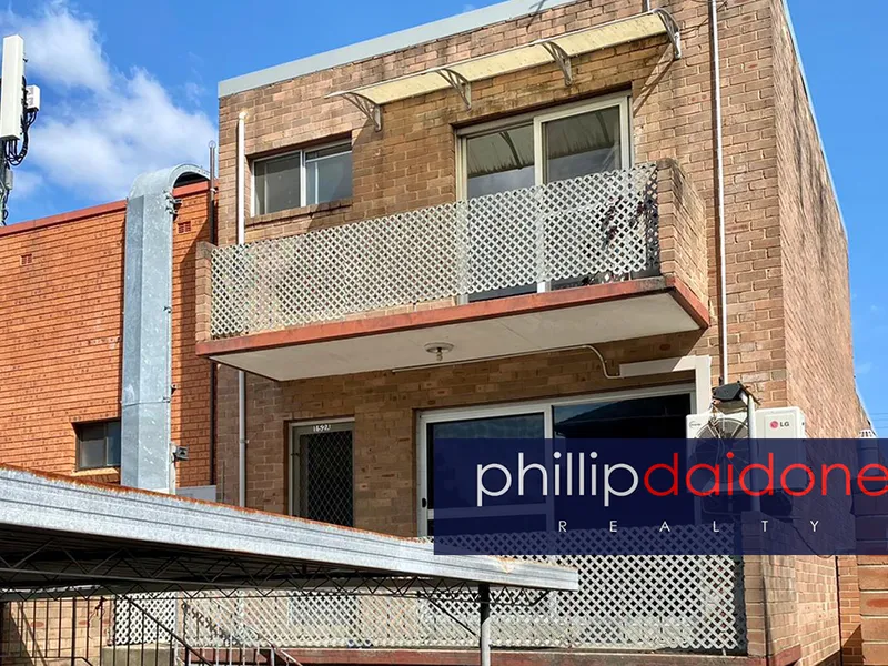 ACROSS FROM STATION...