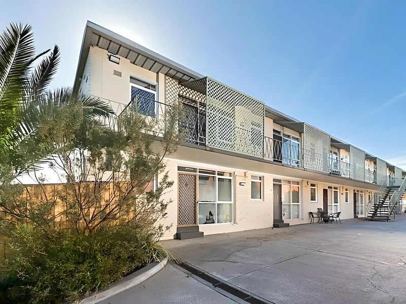 ENVIABLE LOCATION WITH A COURTYARD TO MATCH