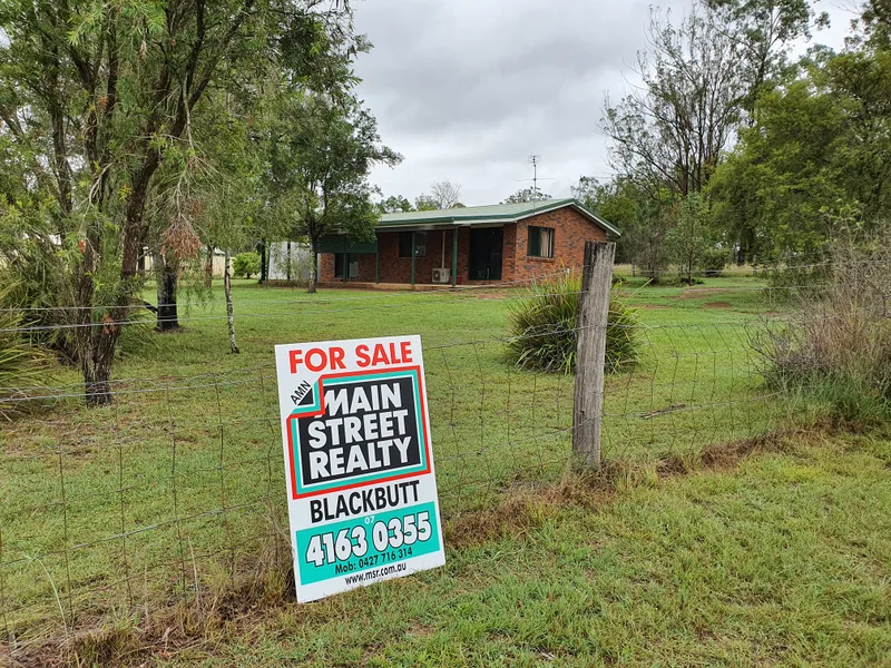 Brick home on 1/2 acre in town