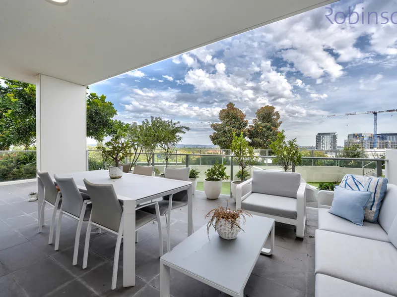 Four bedroom air conditioned apartment with luxe finishes, with a huge outdoor courtyard & entertaining area