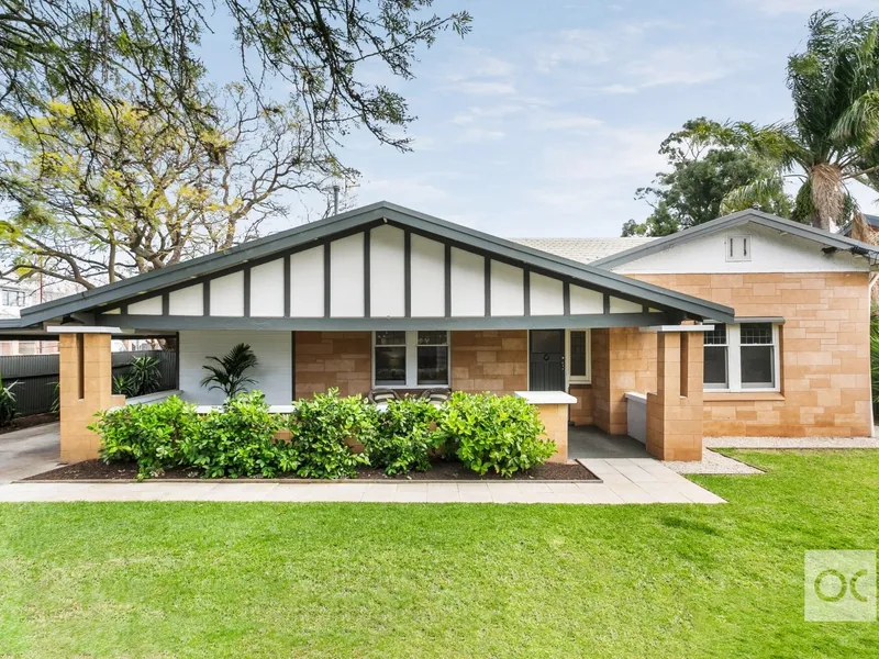 Corner the market with a c.1925 bungalow that's never looked better