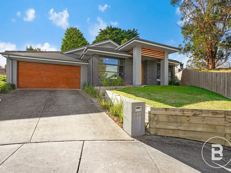 IMMACULATE CONTEMPORARY FOUR BEDROOM HOME.