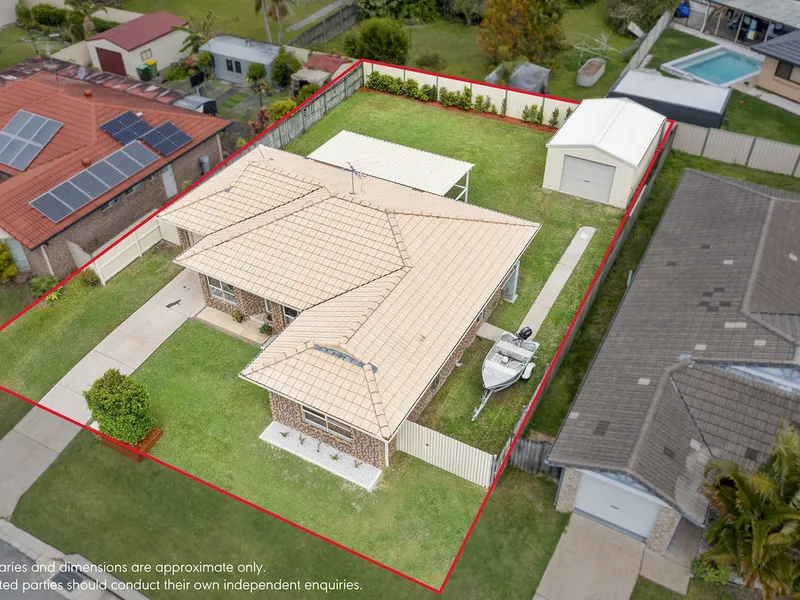 Renovated family home with powered shed and side access.